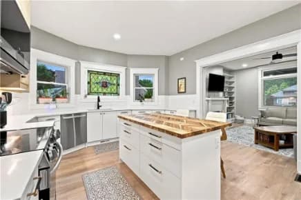 Renovated kitchen with a butcher-block island
